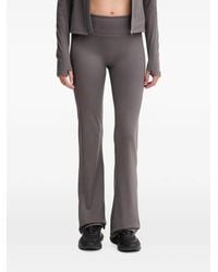 Casall - Flared Broek Met Logoprint - Lyst