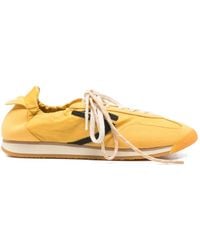 PURAAI - Logo-Detail Sneakers - Lyst