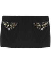 Versace - Fitted Mini Skirt With Flap Pockets - Lyst