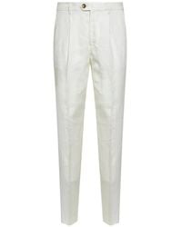 Brunello Cucinelli - Pleated Tapered-Leg Trousers - Lyst