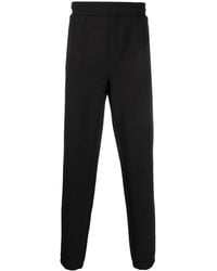 Calvin Klein - Logo-Debossed Track Pants - Lyst