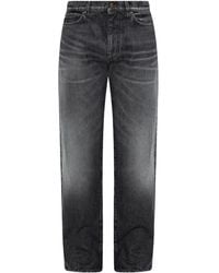 Versace - Jeans Met Geborduurd Logo - Lyst