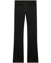 Courreges - Flared Low Waist Broek - Lyst