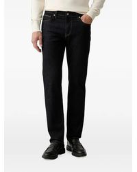 Guess - Logo-Patch Straight-Leg Jeans - Lyst