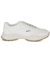 Prada - Logo-Plaque Leather Sneakers - Lyst