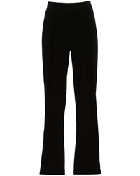 Norma Kamali - Low-waist tapered trousers - Lyst