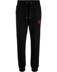 Pinko - Pantalones de chándal con logo - Lyst