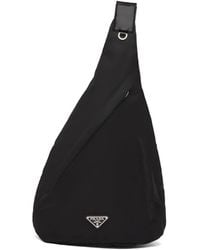 Prada - Re-Nylon Rucksack Mit Logo-Schild - Lyst