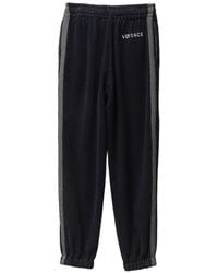 Versace - Cotton-Terry Jacquard Sweatpants - Lyst