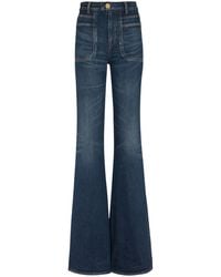 Balmain - Flared Jeans - Lyst