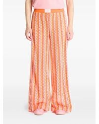 adidas - Gestreepte Firebird Trainingsbroek - Lyst