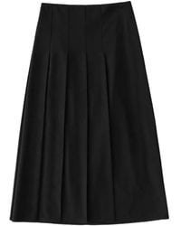 Studio Nicholson - Agat Pleated Midi Skirt - Lyst