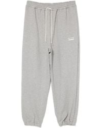 Comme des Garçons - Logo-Print Trousers - Lyst