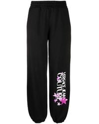 Versace - Pantalon de jogging en coton à logo imprimé - Lyst