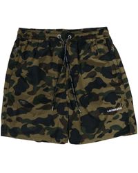A Bathing Ape - Shorts con stampa camouflage - Lyst