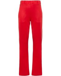 Moncler Pantalon de jogging à bandes contrastantes - Rouge