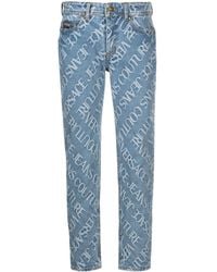 Versace - Melissa Logo-embossed Cropped Jeans - Lyst