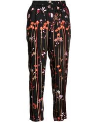 パンツ RED VALENTINO DREAMING PEONY PRINT SILK TROUSERS RED Valentino Dreaming Peony Print Trousers in Red | Lyst