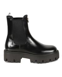 Prada - Bottines En Cuir À Plaque Logo - Lyst