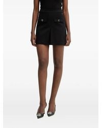 Guess - Embellished-Button Pleated Mini Skirt - Lyst