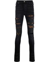 Amiri - Jeans skinny a vita media MX1 - Lyst