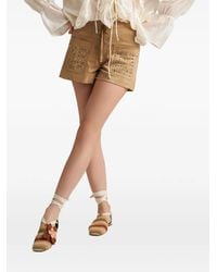 PHO® Firenze - Stud-Embellishment Lace-Up Shorts - Lyst