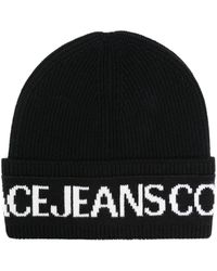 Versace - Intarsia-knit Logo Ribbed-knit Wool Blend Beanie - Lyst