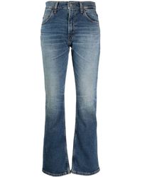 Haikure - Jeans svasati con effetto schiarito - Lyst