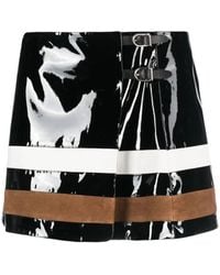 DURAZZI MILANO - Buckle-Fastening Patent-Leather Miniskirt - Lyst