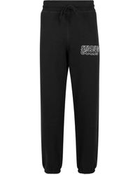 Stadium Goods - Outline Logo Track Pants - Lyst