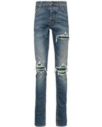 Amiri - Jeans skinny a vita media - Lyst