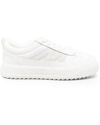 Moncler - Logo-Embossed Ridged-Sole Sneakers - Lyst