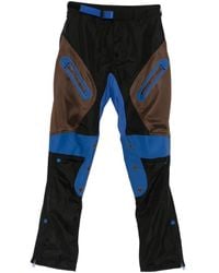 Kiko Kostadinov - X Fox Lab Zip Fox Motif Trousers - Lyst