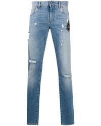 Heren Kleding voor voor Jeans voor Jeans met rechte pijp Dolce & Gabbana Denim Gerafelde Jeans in het Blauw voor heren 