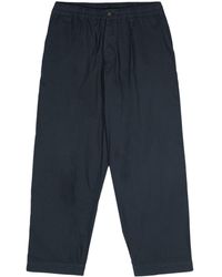 Universal Works - Nearly Pinstriped Oxford Trousers - Lyst