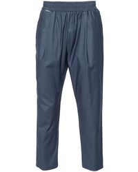 FAMILY FIRST - Tapered-leg Cotton-blend Trousers - Lyst