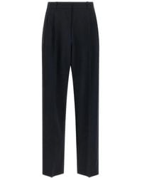 The Row - Mune Pleated Wool Trousers - Lyst