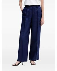 Sisley - Pressed-Crease Wide-Leg Linen Trousers - Lyst
