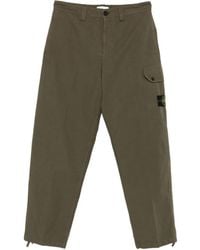 Stone Island - Pantalones de algodón con bolsillos tipo cargo - Lyst