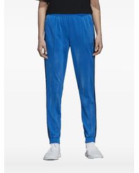 adidas - Pantalones de chándal con tres rayas - Lyst