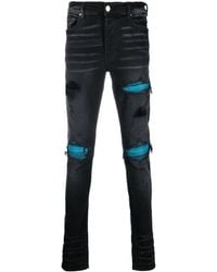 Amiri - Mid-rise Distressed Skinny Jeans - Lyst