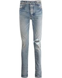 Amiri - Distressed Skinny Jeans - Lyst