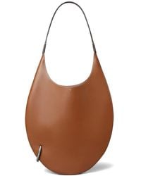 Tory Burch - Pierced Soft Shoulder Bag - Lyst