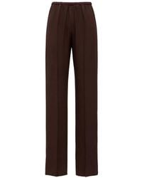forte_forte - Elasticated Side-Slit Trousers - Lyst