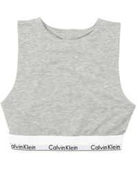 Calvin Klein - Corpiño con correa y logo - Lyst