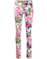 Philipp Plein Vaqueros pitillo con motivo floral - Multicolor