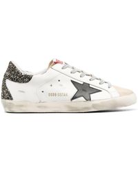 white glitter star snakeskin superstar sneakers