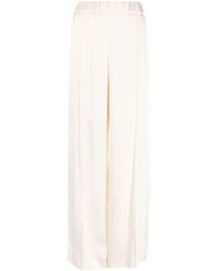 Jil Sander - Pressed-crease Elasticated-waist Flared Trousers - Lyst