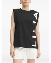 Liviana Conti - Padded-Shoulder Logo Top - Lyst
