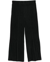 Issey Miyake - Plissé-Effect Trousers - Lyst